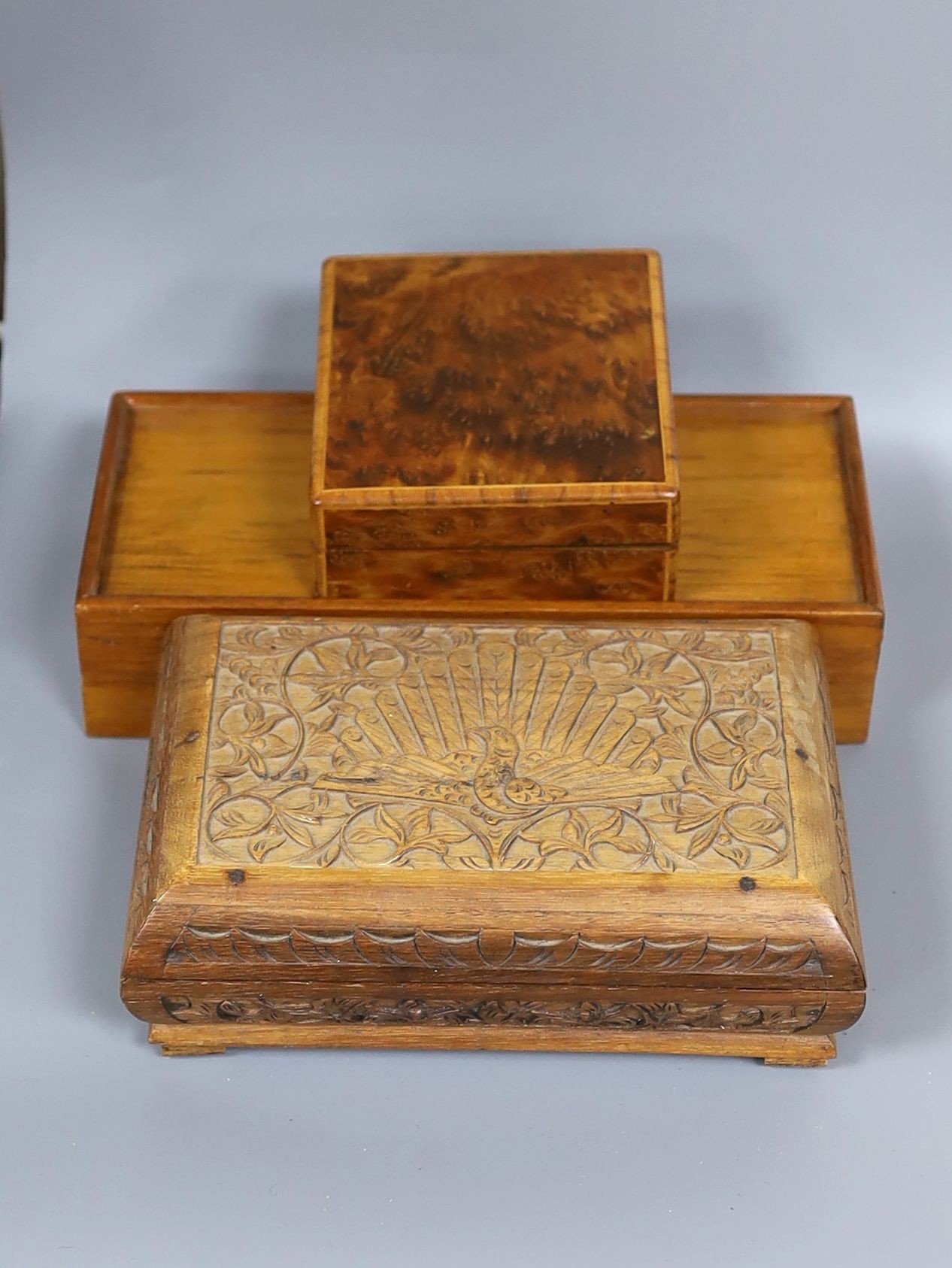 A 19th century bone and ivory draughts set, engraved mother of pearl gaming counters and stained bone tokens, all boxed